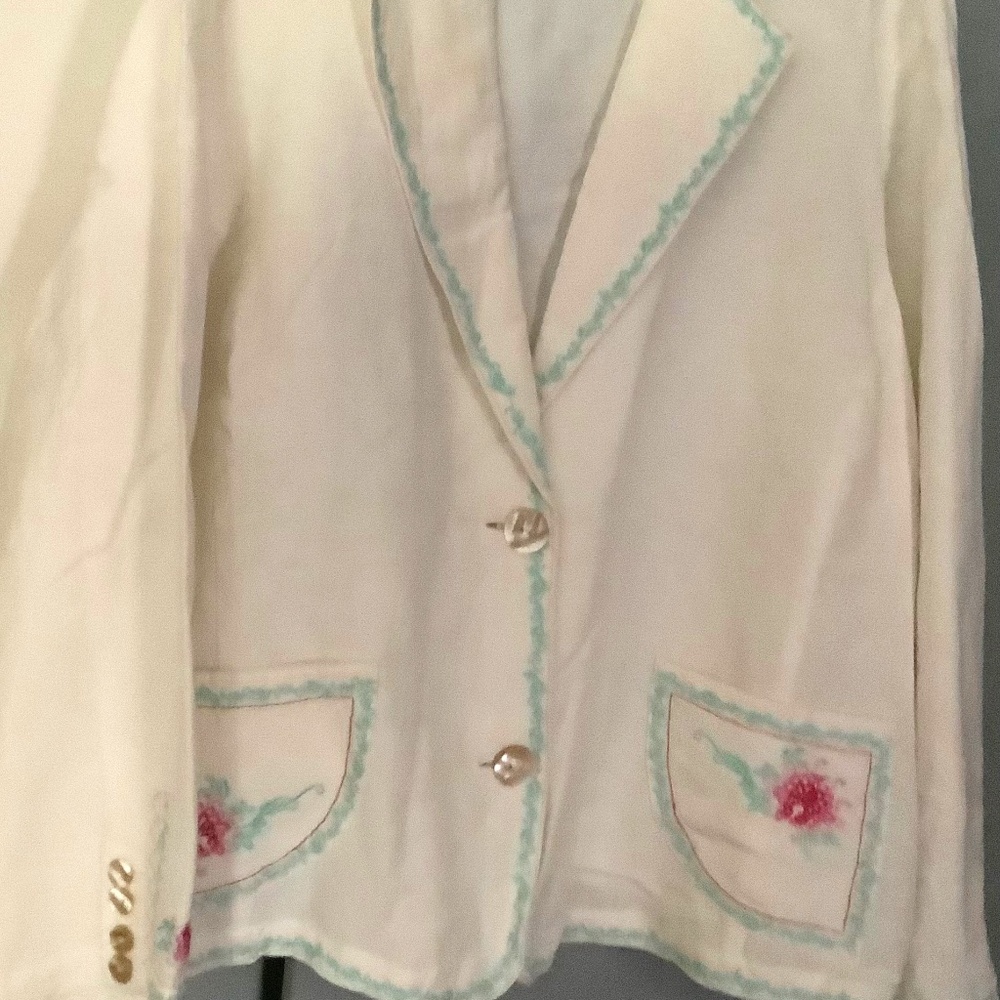 Women’s  jacket, embroidery around notched collar ,bottom & sleeve's.